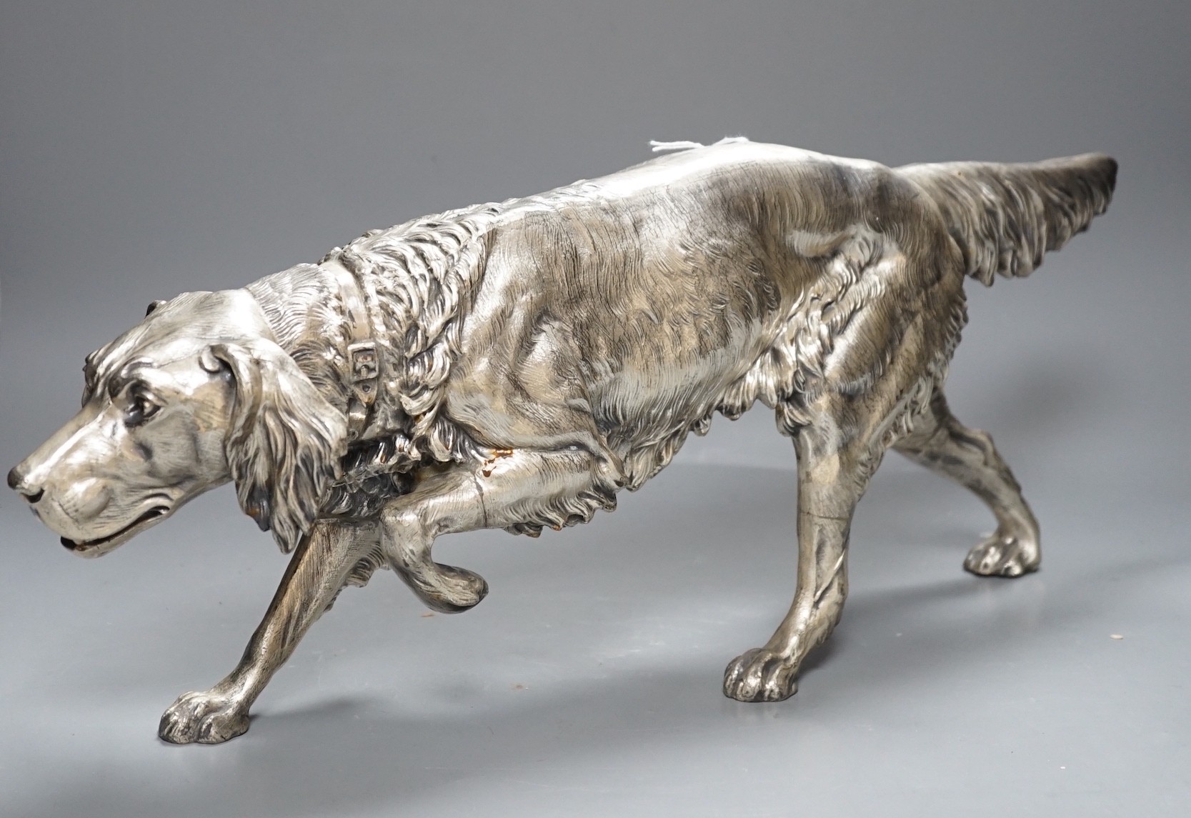 A large Continental silver plated model of a pointer, marked JB 3085, 54cm long